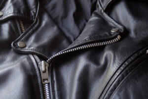 Stylish man wearing a genuine leather jacket